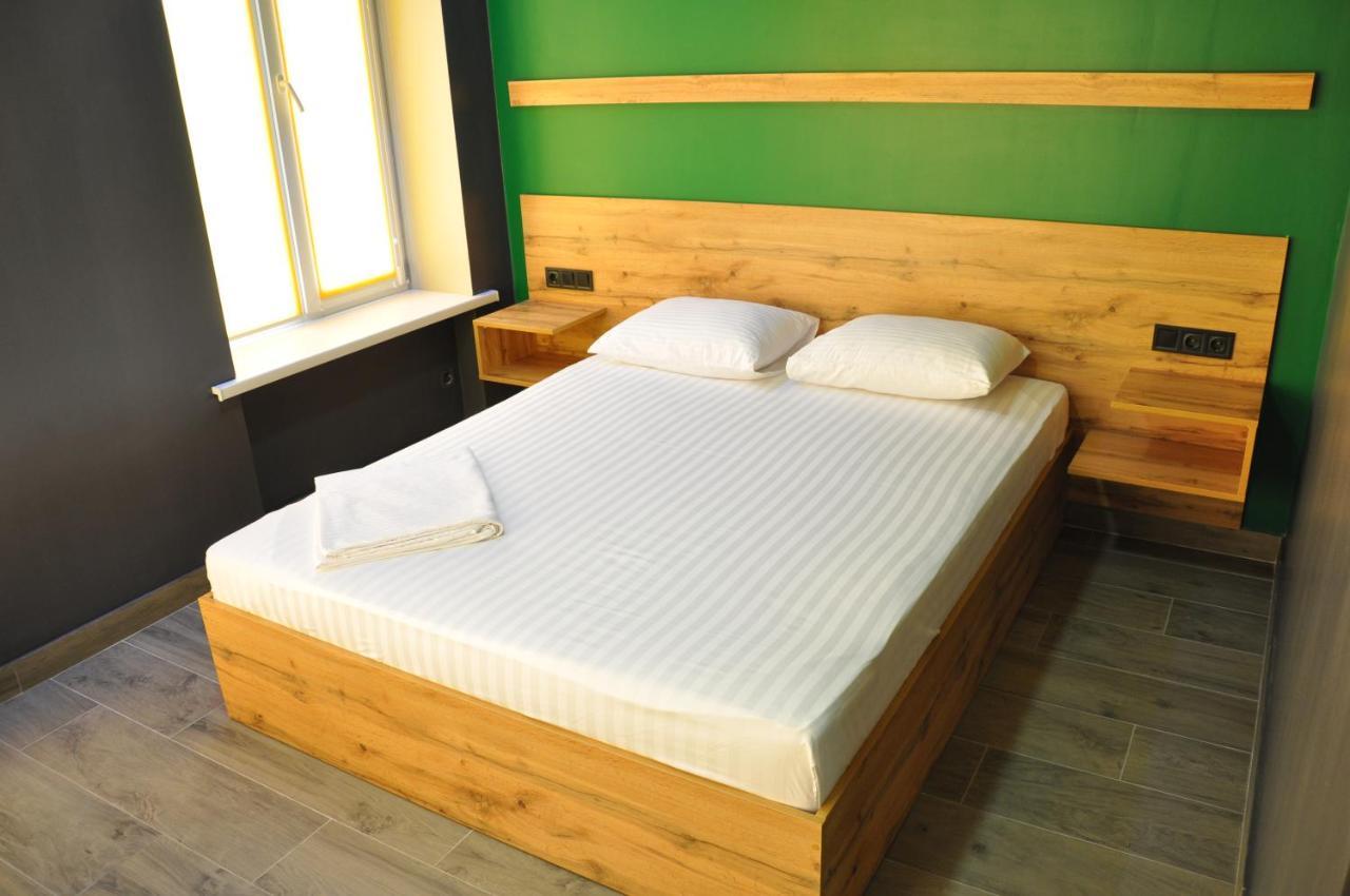 Full House Capsule Hostel Rivne Exterior photo A bed