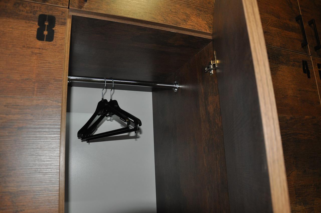 Full House Capsule Hostel Rivne Exterior photo A coat hanger in a wardrobe