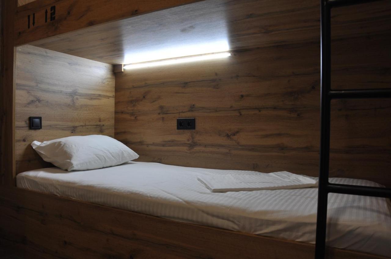 Full House Capsule Hostel Rivne Exterior photo A bed in a hostel
